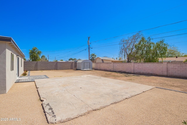 3249 E Nisbet Rd, Phoenix, AZ 85032 - view of patio / terrace featuring a storage shed, a fenced backyard, and an outdoor structure