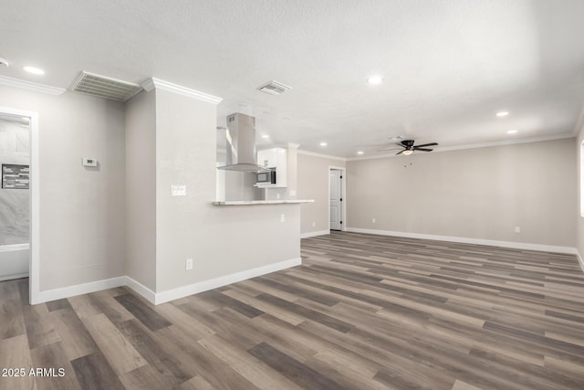 3249 E Nisbet Rd, Phoenix, AZ 85032 - unfurnished living room featuring ornamental molding, wood finished floors, visible vents, and ceiling fan
