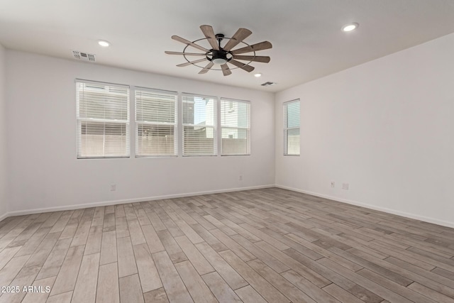 1857 W 22nd Ave, Apache Junction, AZ 85120 - empty room featuring a ceiling fan, light wood finished floors, recessed lighting, and baseboards