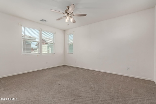 1857 W 22nd Ave, Apache Junction, AZ 85120 - carpeted empty room with ceiling fan and baseboards