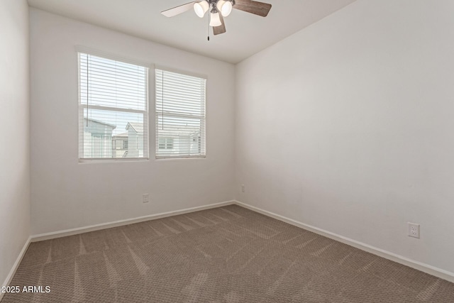 1857 W 22nd Ave, Apache Junction, AZ 85120 - carpeted empty room with a ceiling fan and baseboards