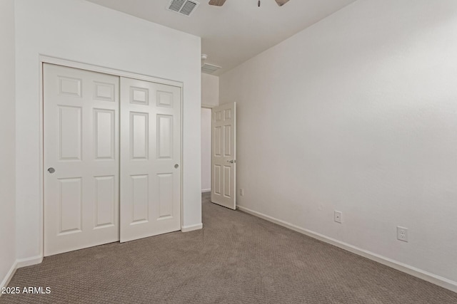 1857 W 22nd Ave, Apache Junction, AZ 85120 - unfurnished bedroom with carpet flooring, a closet, baseboards, and a ceiling fan