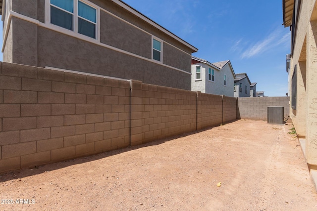 1857 W 22nd Ave, Apache Junction, AZ 85120 - fenced backyard featuring central air condition unit and a residential view