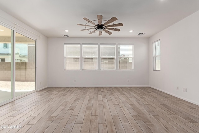 1857 W 22nd Ave, Apache Junction, AZ 85120 - empty room with light wood finished floors, a ceiling fan, baseboards, and recessed lighting