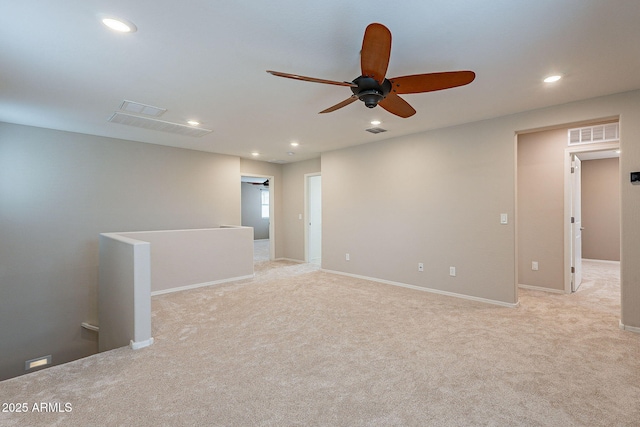 unfurnished room with visible vents, recessed lighting, and a ceiling fan