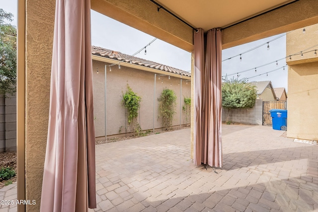 view of patio with fence