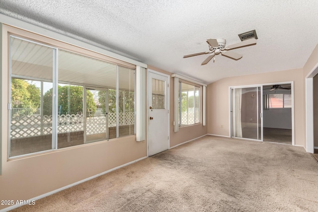 interior space with ceiling fan