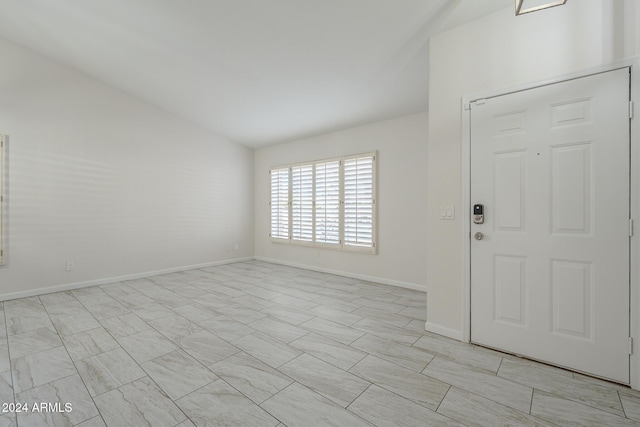 foyer with lofted ceiling