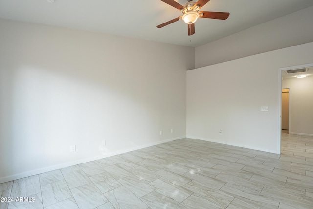 spare room featuring ceiling fan