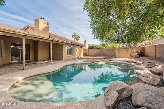 view of swimming pool featuring a patio