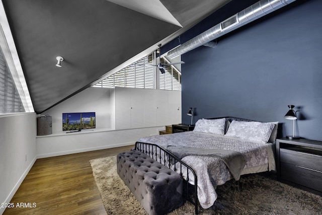 802 S 5th Ave, Tucson, AZ 85701 - bedroom with wood finished floors and baseboards