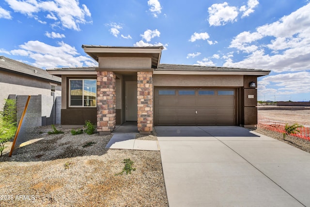 prairie-style home with a garage