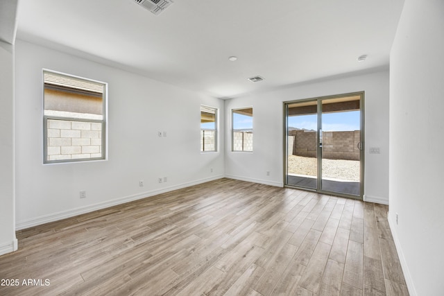 empty room featuring light hardwood / wood-style floors