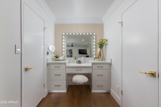8317 E Orange Blossom Ln, Scottsdale, AZ 85250 - bathroom featuring wood finished floors, vanity, crown molding, a ceiling fan, and baseboards