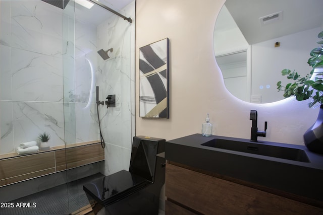 8317 E Orange Blossom Ln, Scottsdale, AZ 85250 - full bathroom featuring vanity and a marble finish shower