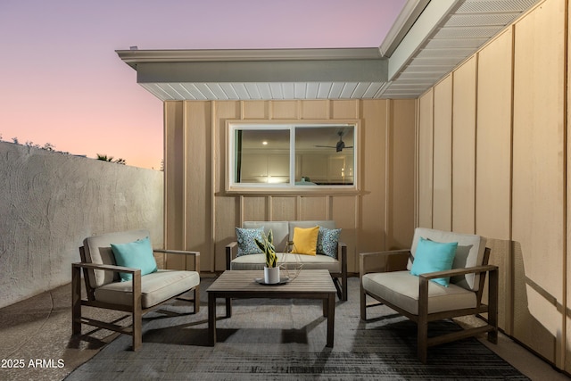 8317 E Orange Blossom Ln, Scottsdale, AZ 85250 - patio terrace at dusk with a patio and an outdoor hangout area