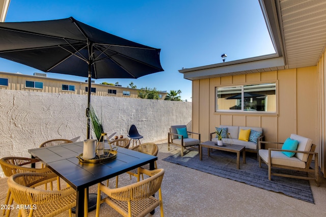 8317 E Orange Blossom Ln, Scottsdale, AZ 85250 - view of patio / terrace with an outdoor living space and outdoor dining space