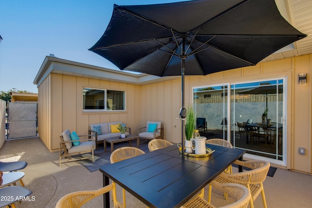8317 E Orange Blossom Ln, Scottsdale, AZ 85250 - view of patio featuring outdoor dining space and an outdoor living space