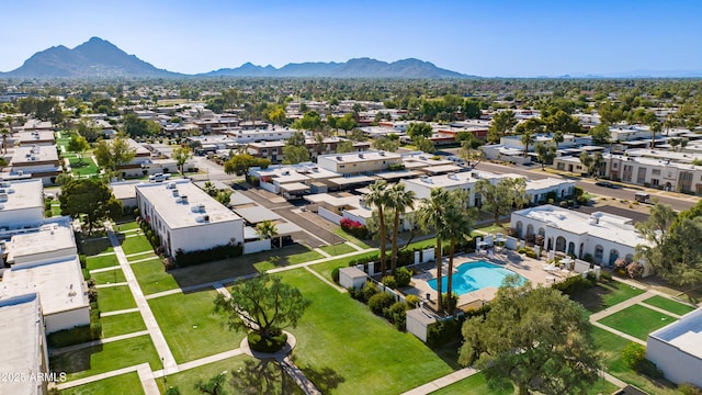 8317 E Orange Blossom Ln, Scottsdale, AZ 85250 - aerial perspective of suburban area with a pool area and mountains