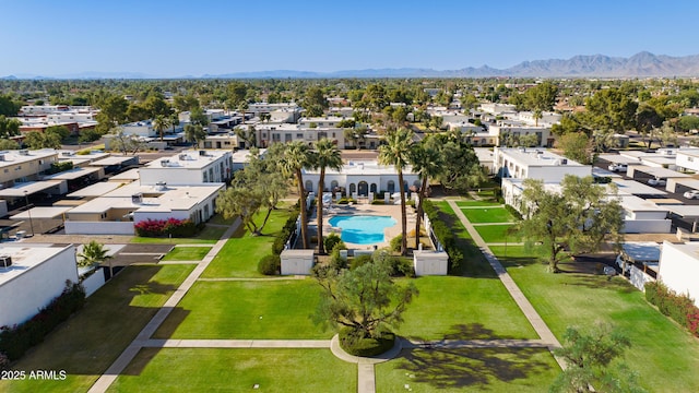 8317 E Orange Blossom Ln, Scottsdale, AZ 85250 - aerial perspective of suburban area with a pool area and mountains