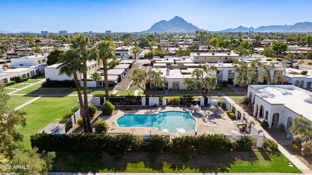 8317 E Orange Blossom Ln, Scottsdale, AZ 85250 - aerial perspective of suburban area featuring a pool area and mountains