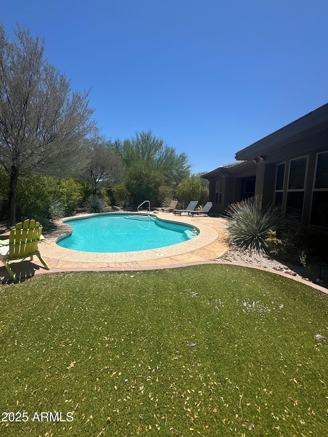 18008 W Ocotillo Ave, Goodyear, AZ 85338 - swimming pool with a lawn and a patio area