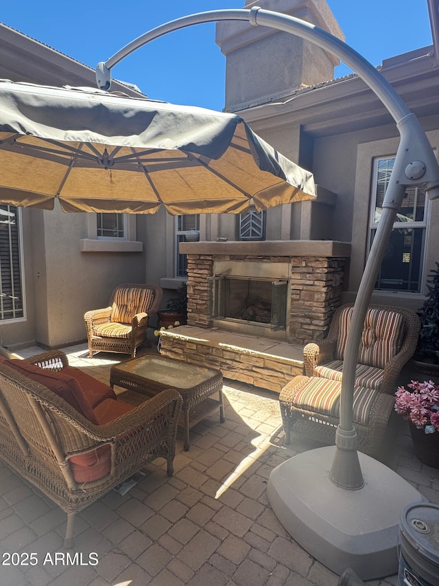 18008 W Ocotillo Ave, Goodyear, AZ 85338 - view of patio featuring an outdoor living space with a fireplace