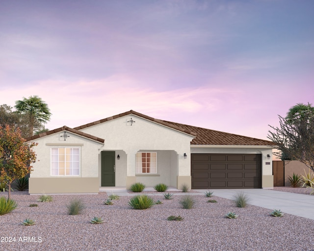 view of front of home with a garage