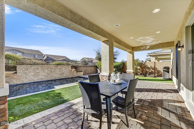 view of patio / terrace with a grill