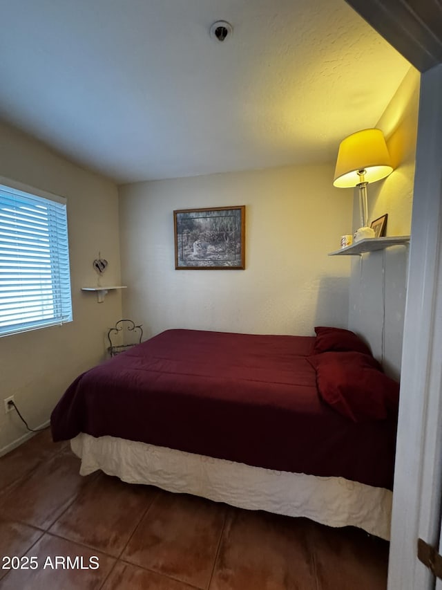 12123 W Bell Rd Unit 337, Surprise, AZ 85378 - bedroom featuring tile patterned flooring