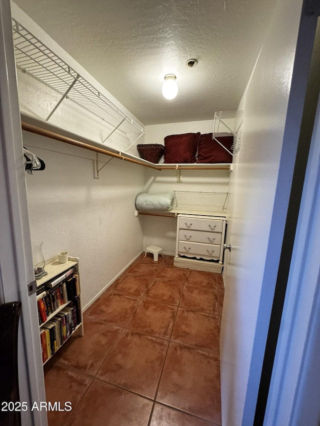 12123 W Bell Rd Unit 337, Surprise, AZ 85378 - walk in closet with tile patterned flooring