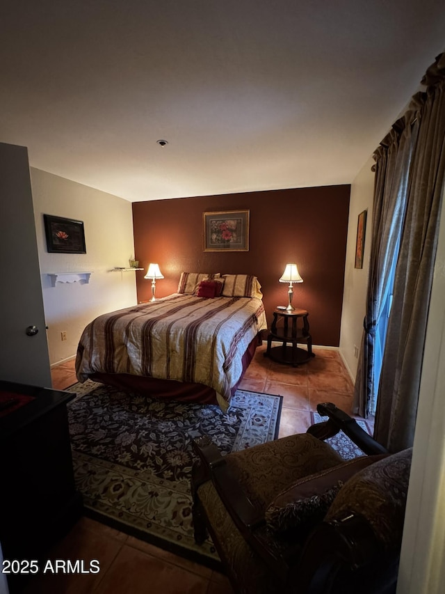 12123 W Bell Rd Unit 337, Surprise, AZ 85378 - bedroom with tile patterned floors