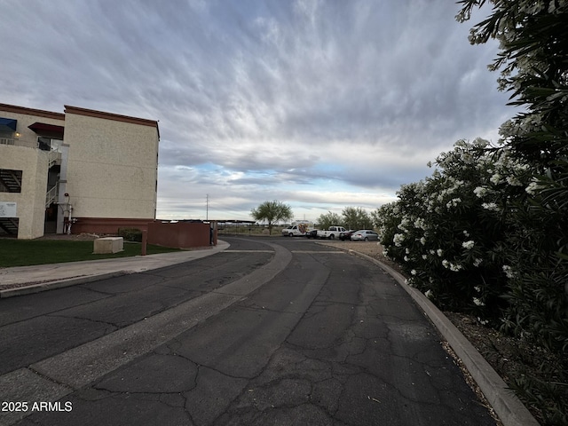 12123 W Bell Rd Unit 337, Surprise, AZ 85378 - view of asphalt street featuring curbs