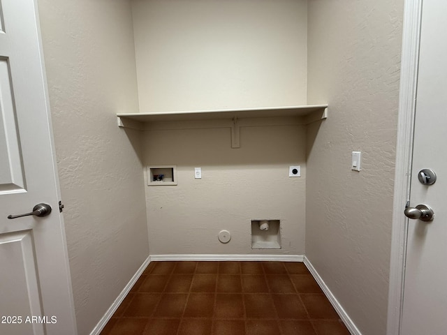 laundry area with baseboards, laundry area, hookup for a washing machine, and hookup for an electric dryer