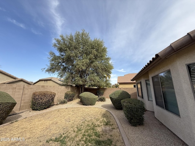 view of yard featuring a fenced backyard