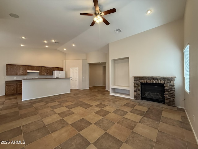 unfurnished living room with a fireplace, visible vents, ceiling fan, high vaulted ceiling, and baseboards