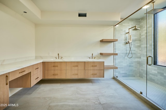 bathroom with vanity and an enclosed shower