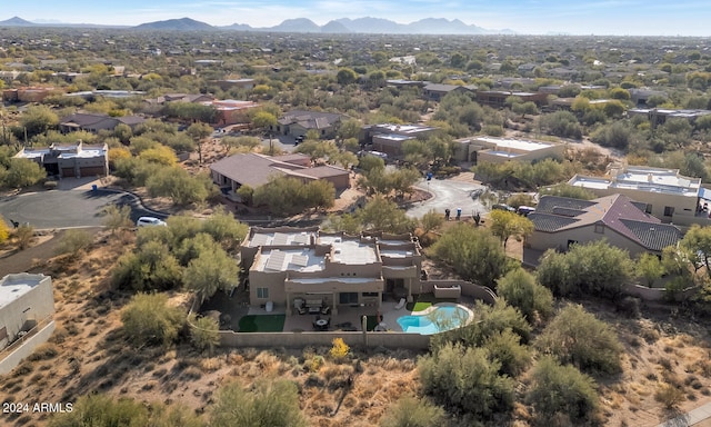 drone / aerial view featuring a mountain view