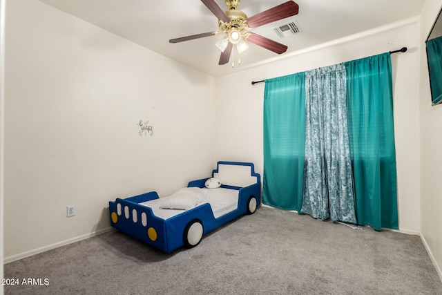 carpeted bedroom with ceiling fan