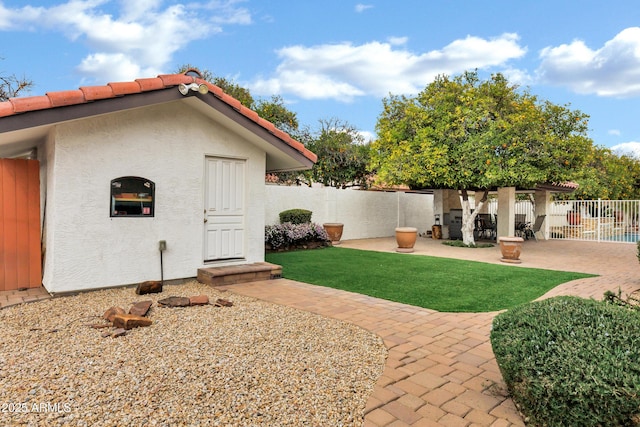 view of yard with a patio area and fence