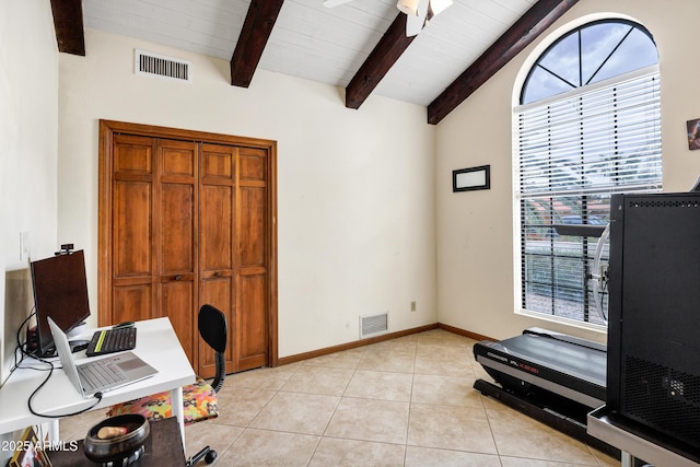 home office featuring light tile patterned floors, visible vents, vaulted ceiling with beams, and baseboards