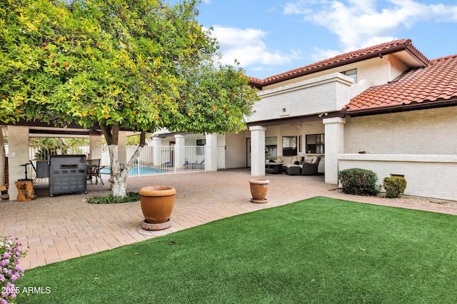 view of patio / terrace featuring outdoor lounge area and fence