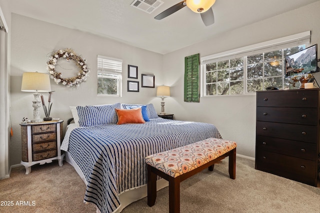 carpeted bedroom featuring ceiling fan