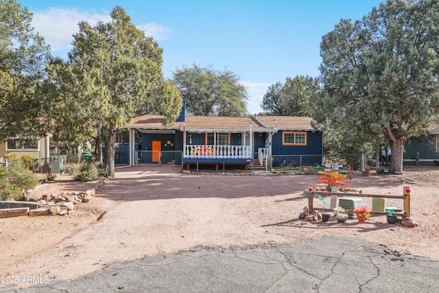 single story home with covered porch