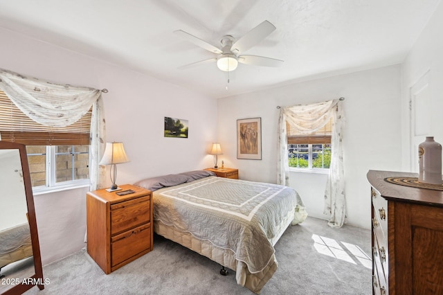 bedroom featuring carpet and a ceiling fan