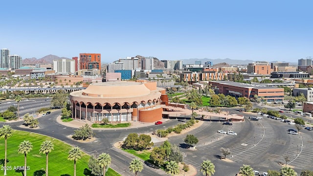 property's view of city featuring a mountain view