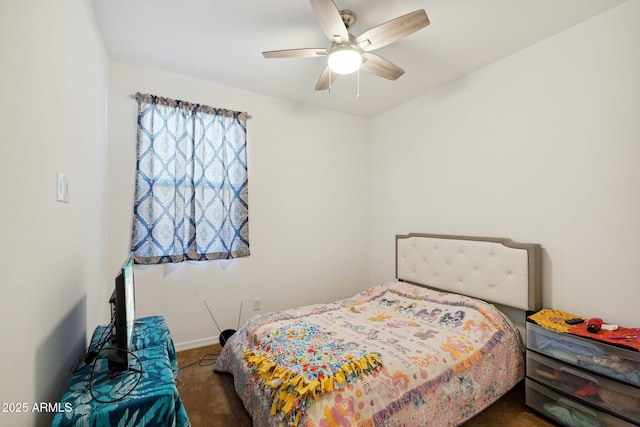 bedroom with ceiling fan and carpet flooring