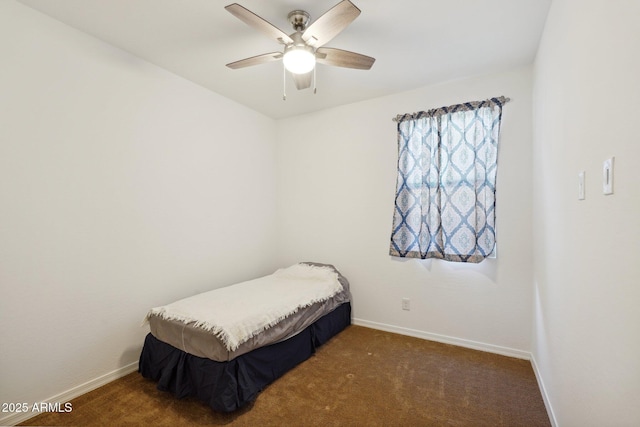 bedroom featuring carpet floors, ceiling fan, and baseboards