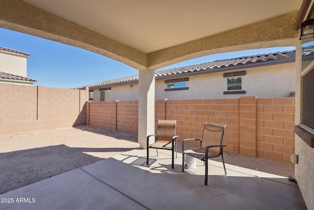 view of patio with a fenced backyard