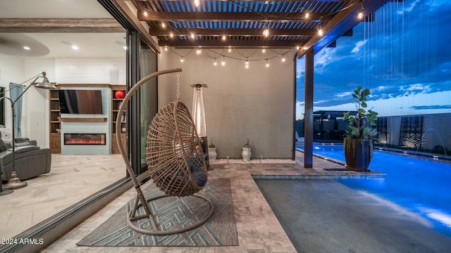 view of patio featuring a pergola and pool water feature